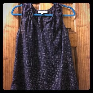 Loft navy and white polka dot shell with tie neck.